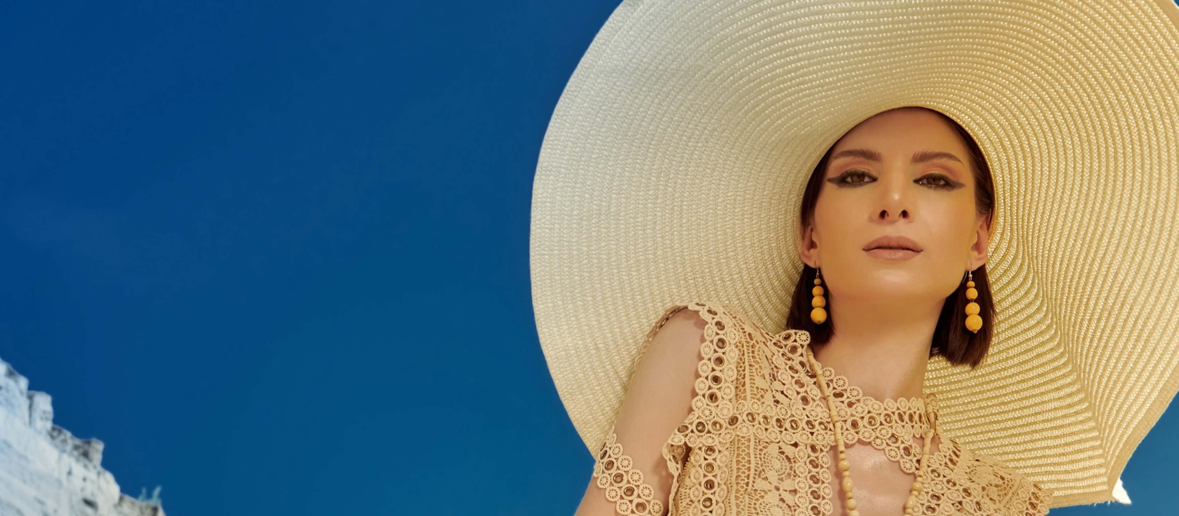 Woman with a wide brimmed hat